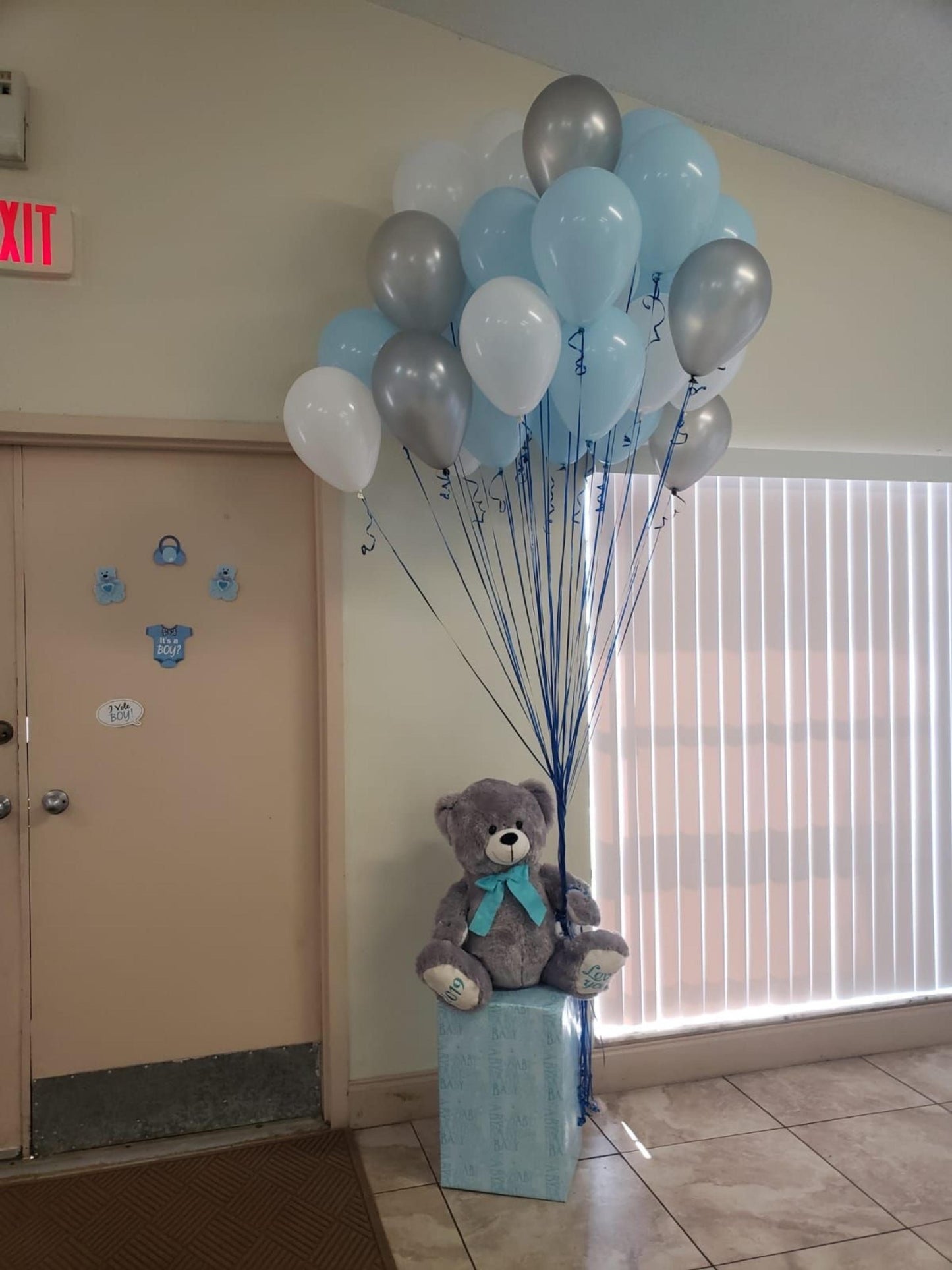 surprise welcome gift with balloon and teddy bear